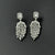white stone 925 silver earrings
